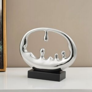 Enhance your interior with this modern abstract silver sculpture featuring a fluid, artistic form and a sleek chrome finish. A perfect decorative accent for contemporary homes, offices, shelves, and coffee tables.